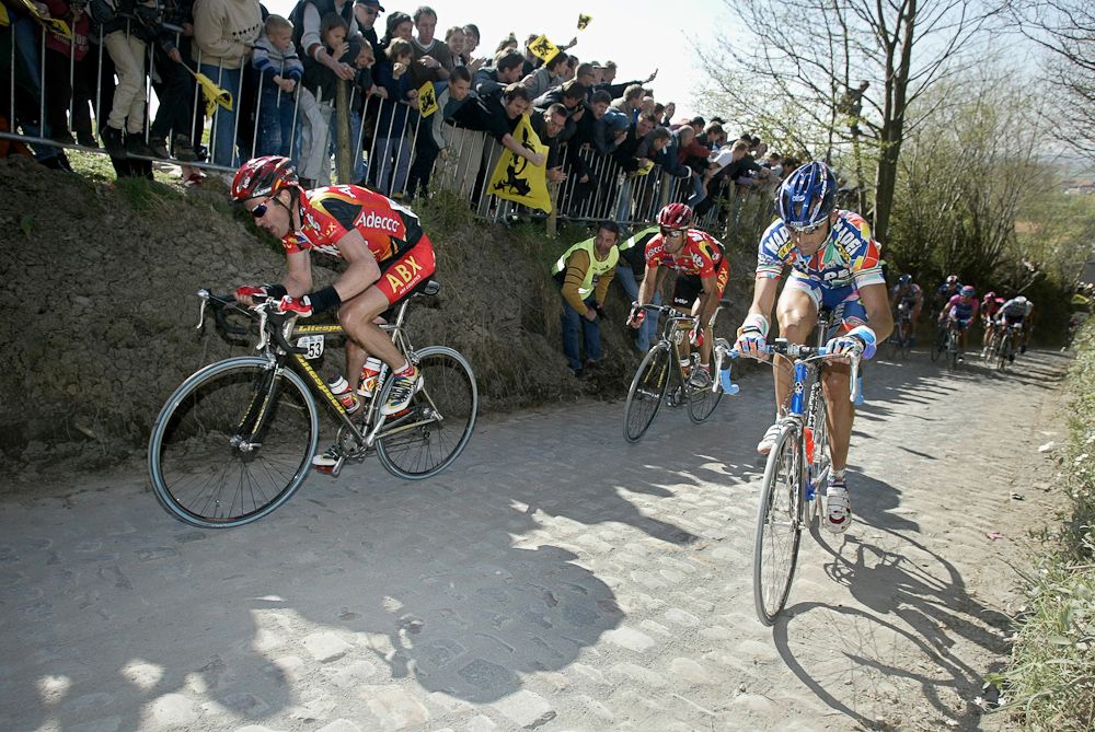 Serge Baguet of Lotto and Andrea Tafi of Mapei in 2002.