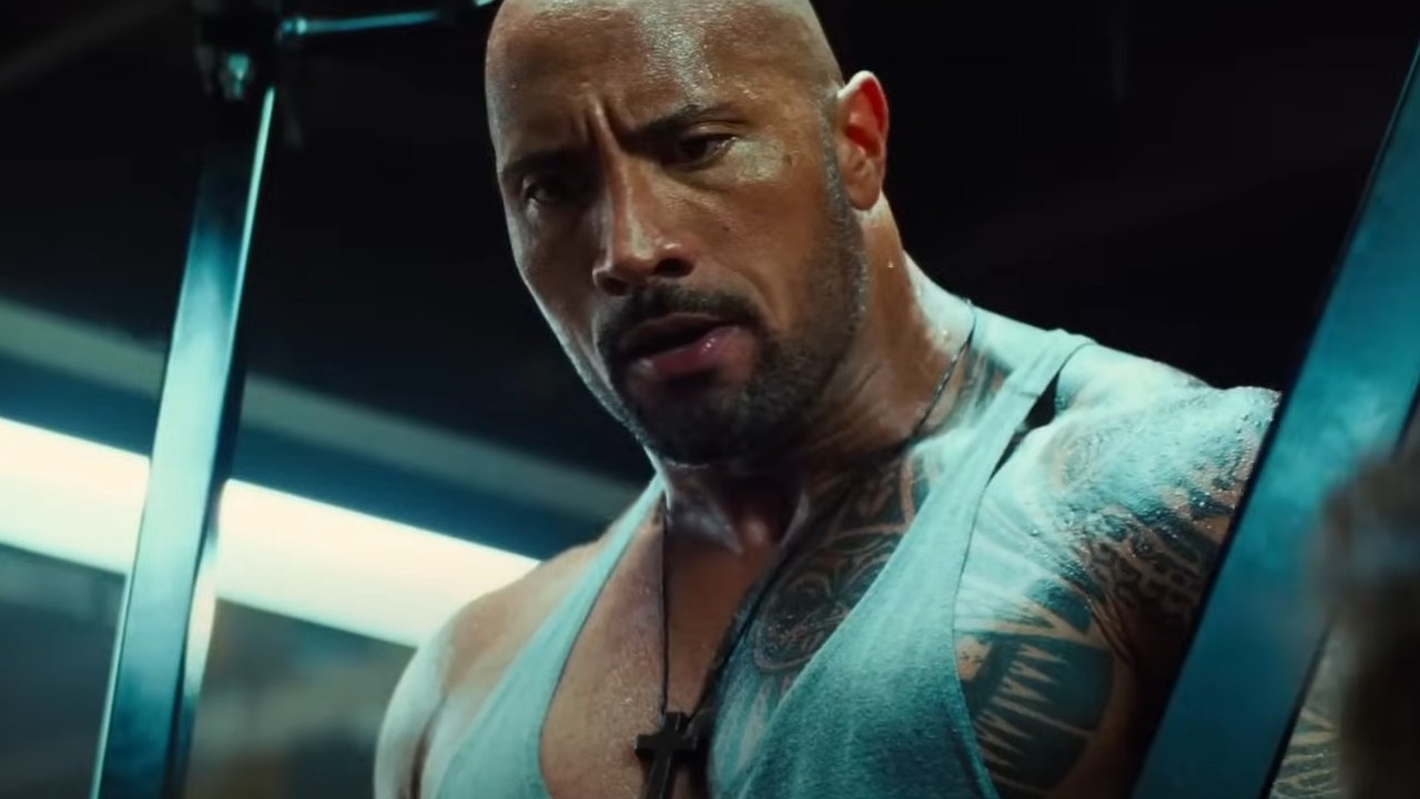 Dwayne Johnson lifting weights in Pain &amp;amp; Gain