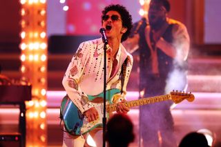 : Bruno Mars of Silk Sonic performs onstage during the 64th Annual GRAMMY Awards at MGM Grand Garden Arena on April 03, 2022 in Las Vegas, Nevada