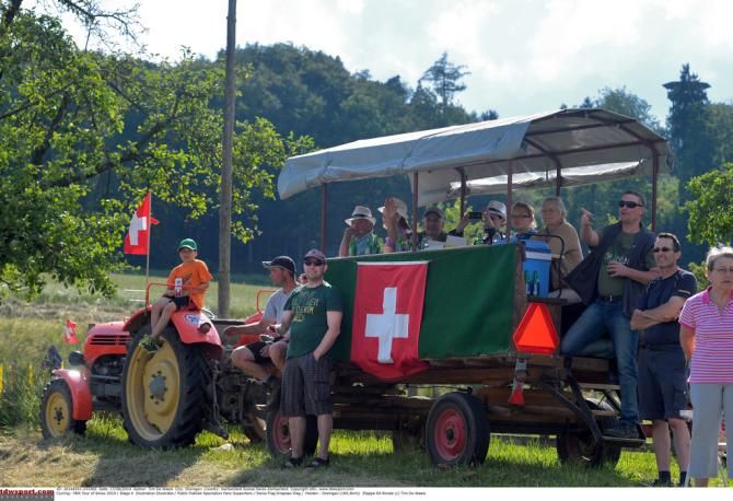 Swiss fans line the roadside
