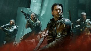 Four soldiers move through red gas with their weapons drawn