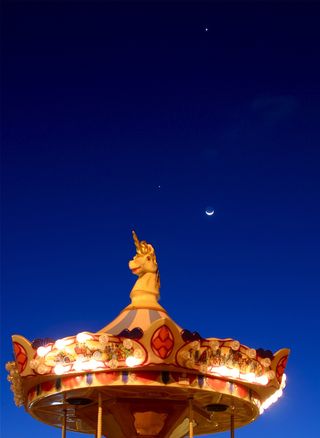 Jupiter, Venus and the Moon over a Carousel, Tenerife, Spain