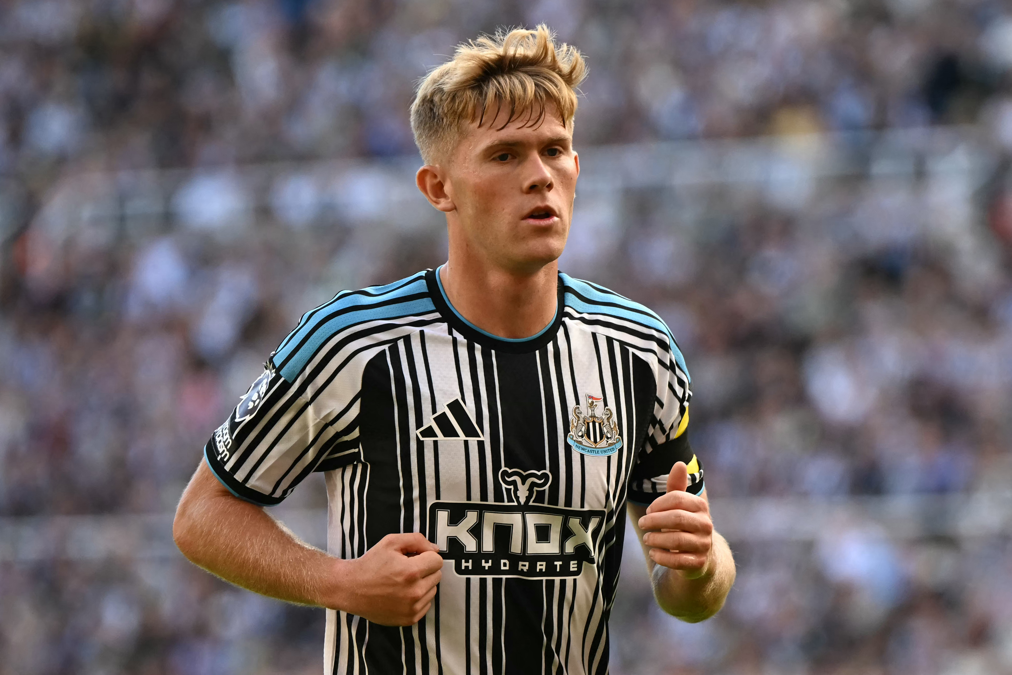 Newcastle United's English midfielder #03 Lewis Hall during the English Premier League football match between Newcastle United and Liverpool at St James' Park in Newcastle-upon-Tyne, north east England on August 23, 2026. (Photo by Paul ELLIS / AFP) / RESTRICTED TO EDITORIAL USE. No use with unauthorized audio, video, data, fixture lists, club/league logos or 'live' services. Online in-match use limited to 120 images. An additional 40 images may be used in extra time. No video emulation. Social media in-match use limited to 120 images. An additional 40 images may be used in extra time. No use in betting publications, games or single club/league/player publications. /