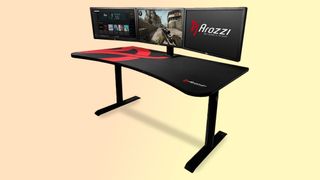 Arozzi Arena Gaming Desk on pastel background