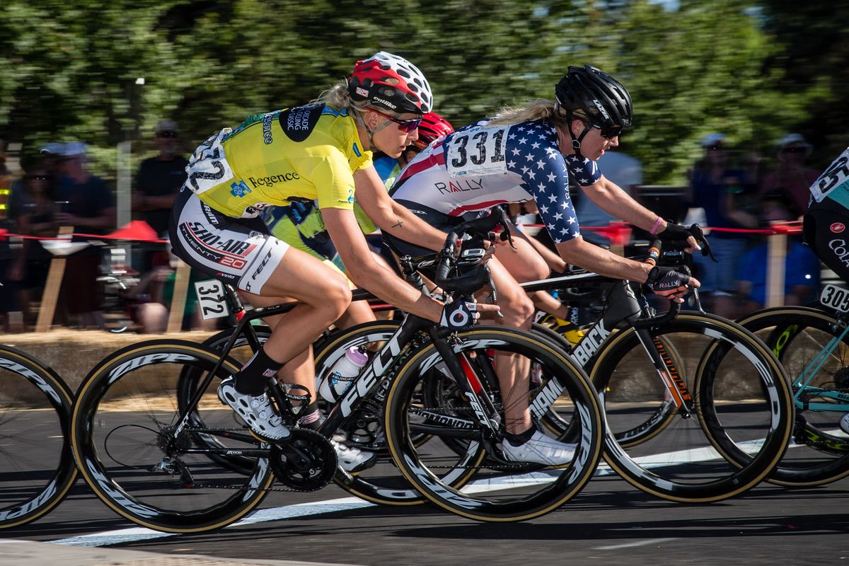 Race leader Allie Dragoo (Twenty20) and Erica Allar (Rally) riding together through a turn.