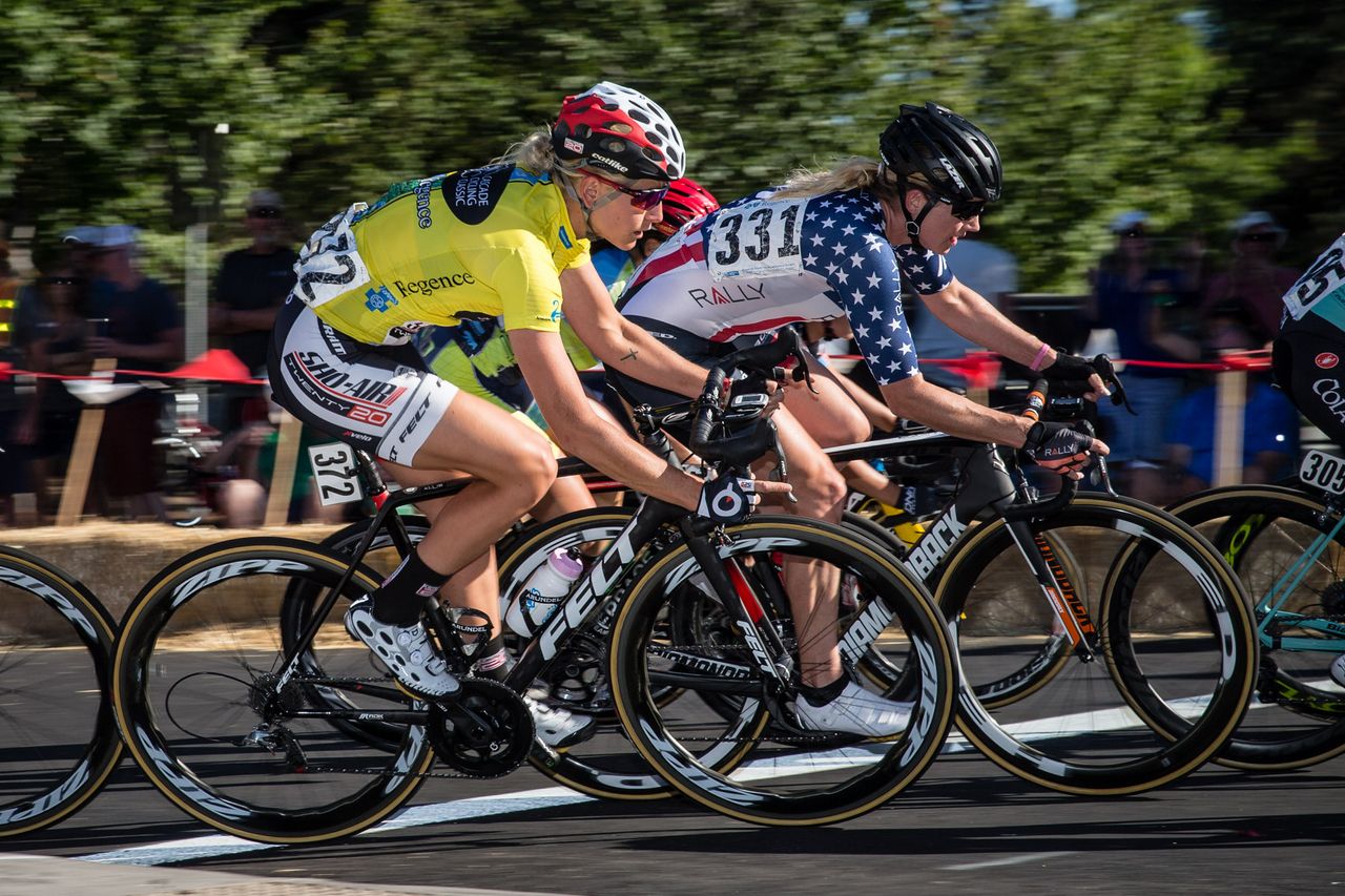Race leader Allie Dragoo (Twenty20) and Erica Allar (Rally) riding together through a turn.