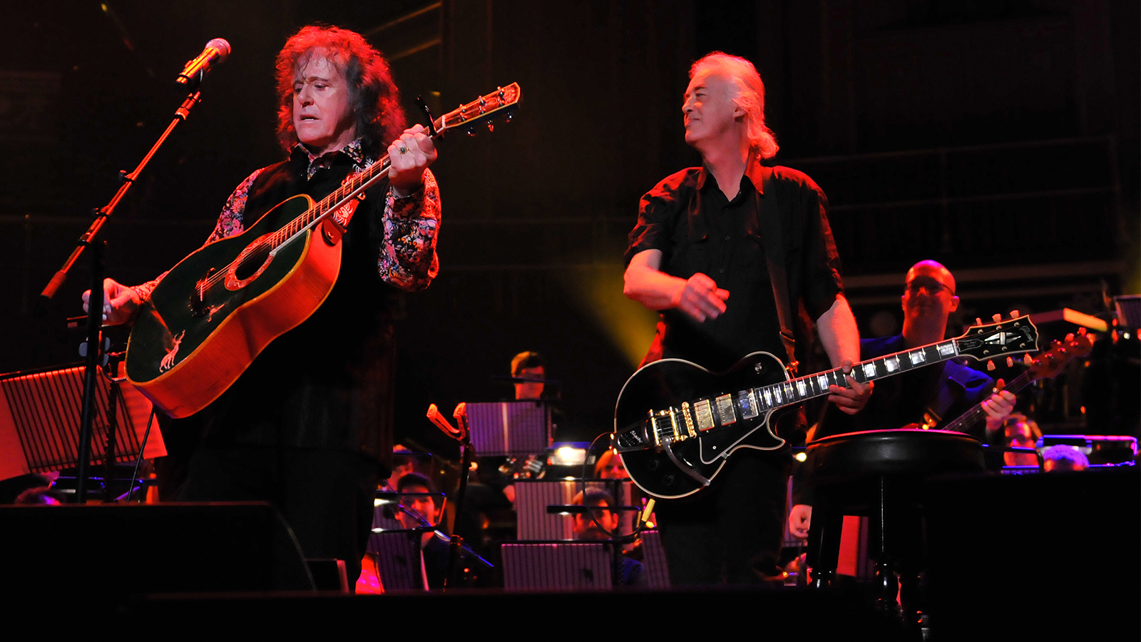 LONDON, UNITED KINGDOM - JUNE 03: Donovan and Jimmy Page perform songs from Donovan's 1966 classic album 'Sunshine Superman' with the London Contemporay Orchestra at Royal Albert Hall on June 3, 2011 in London, United Kingdom. (Photo by C Brandon/Redferns)