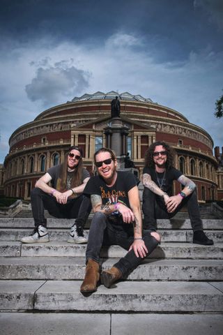 The Cadillac Three on the steps outside the Royal Albert Hall