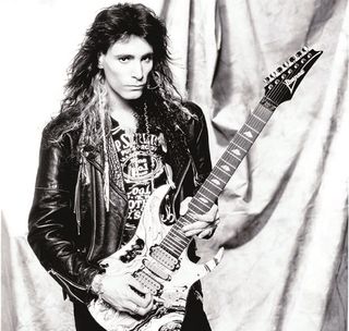 Steve Vai with the Ibanez Universe UV7, the seven-string guitar he helped design in 1990