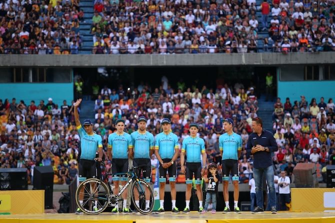 The Astana team enjoys the crowd's cheers at the teams presentation