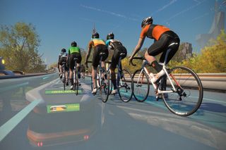 Image shows cyclist avatars riding on the virtual cycling platform Zwift.