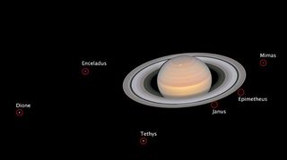 This composite image taken by the Hubble Space Telescope on June 6, 2018 shows Saturn with 6 of its 62 known moons.