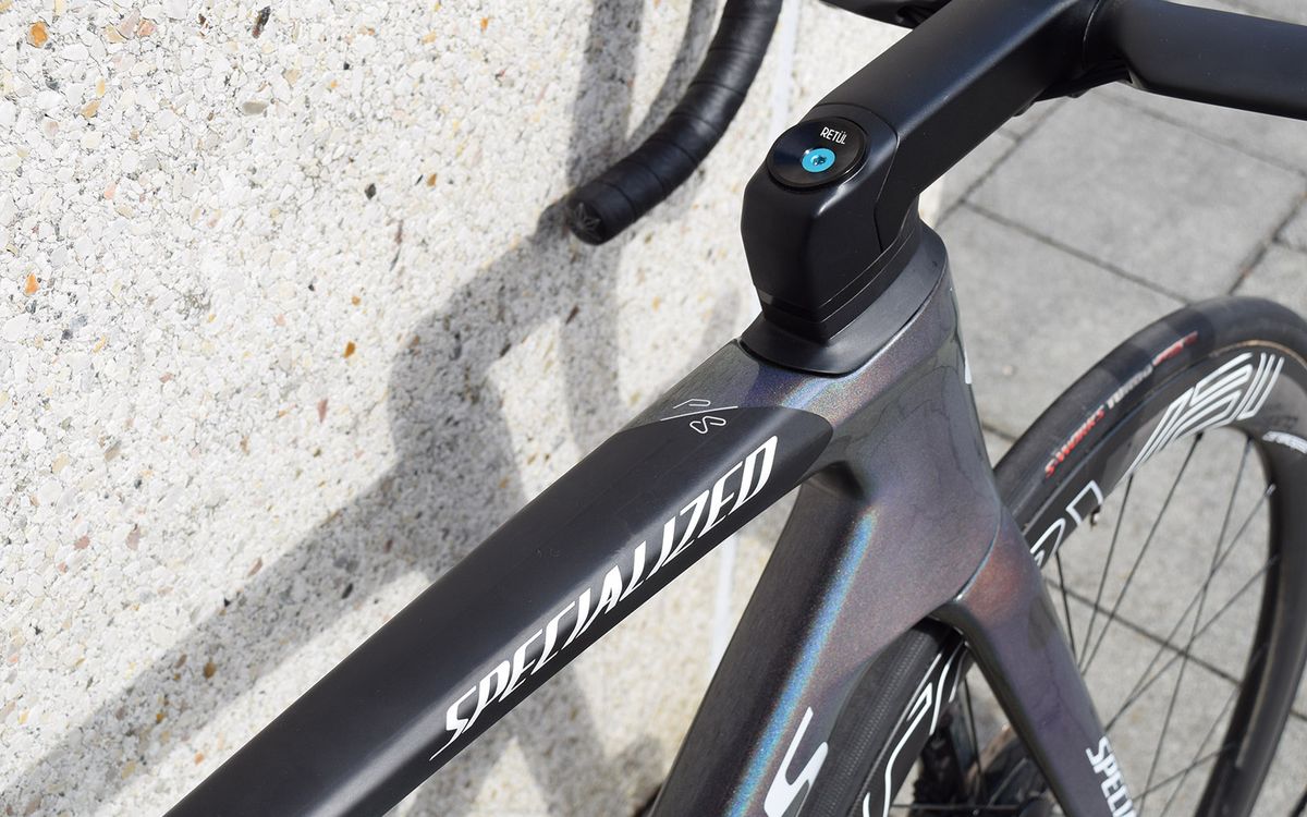 The top tube has a split between the glitter and matt finishes