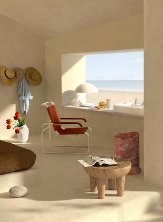 Bathroom with sink, wooden chair, coffee table next to large window with an ocean view.