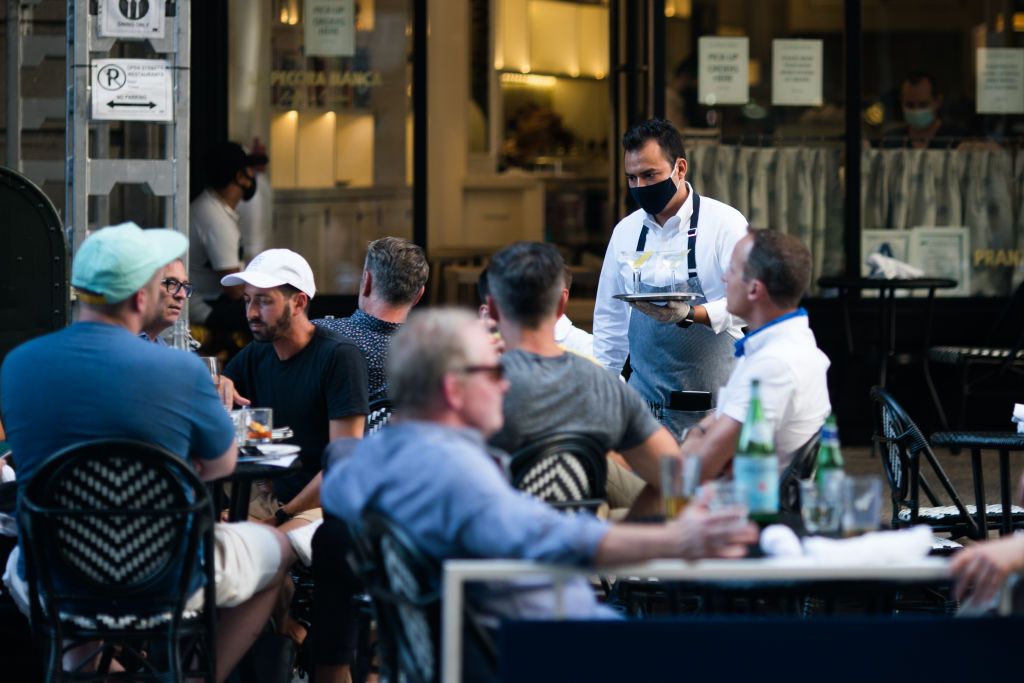 Waiter with mask.