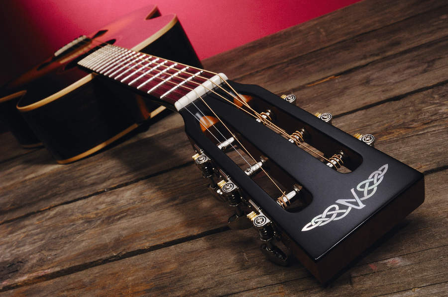 The S320A features a slot headstock.