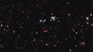 a deep view of space showing thousands of galaxies