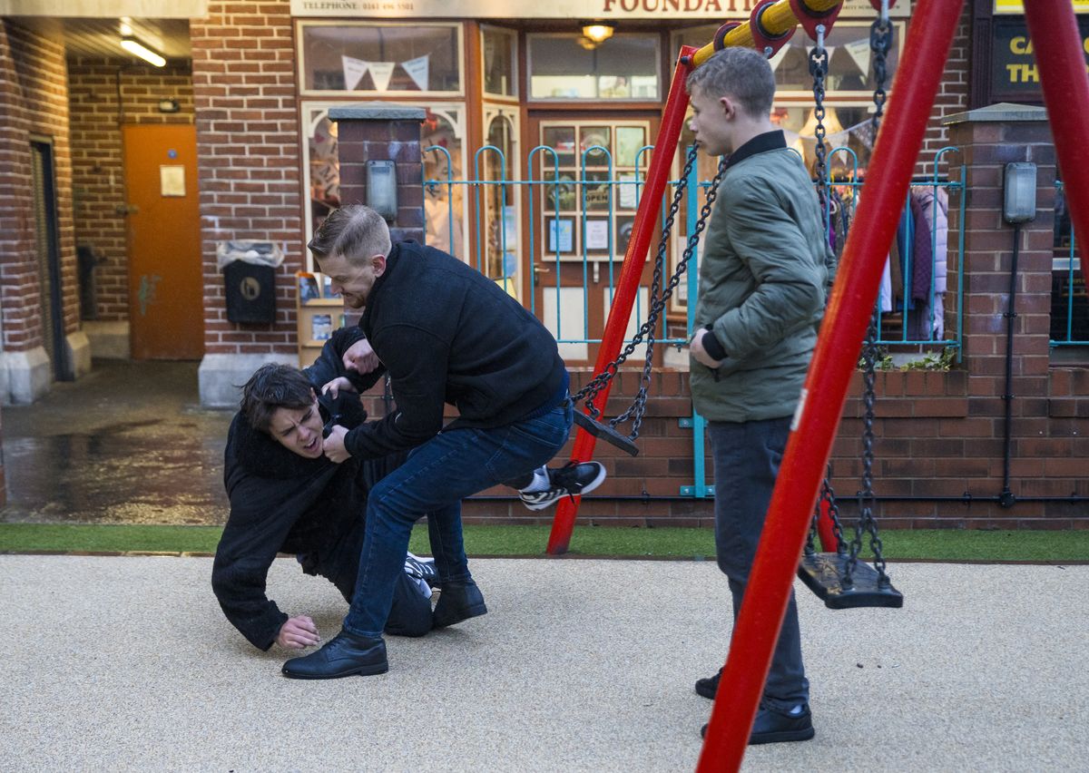 Gary Windass throws Mason to the floor.