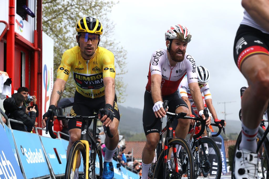 MALLABIA SPAIN APRIL 08 LR Primoz Roglic of Slovenia and Team Jumbo Visma Yellow Leader Jersey and Simon Geschke of Germany and Team Cofidis cross the finish line during the 61st Itzulia Basque Country 2022 Stage 5 a 1638km stage from Zamudio to Mallabia 305m itzulia WorldTour on April 08 2022 in Mallabia Spain Photo by Gonzalo Arroyo MorenoGetty Images