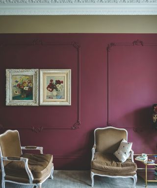 farrow and ball preference red painted on a large detailed wall with vintage furnishings and art