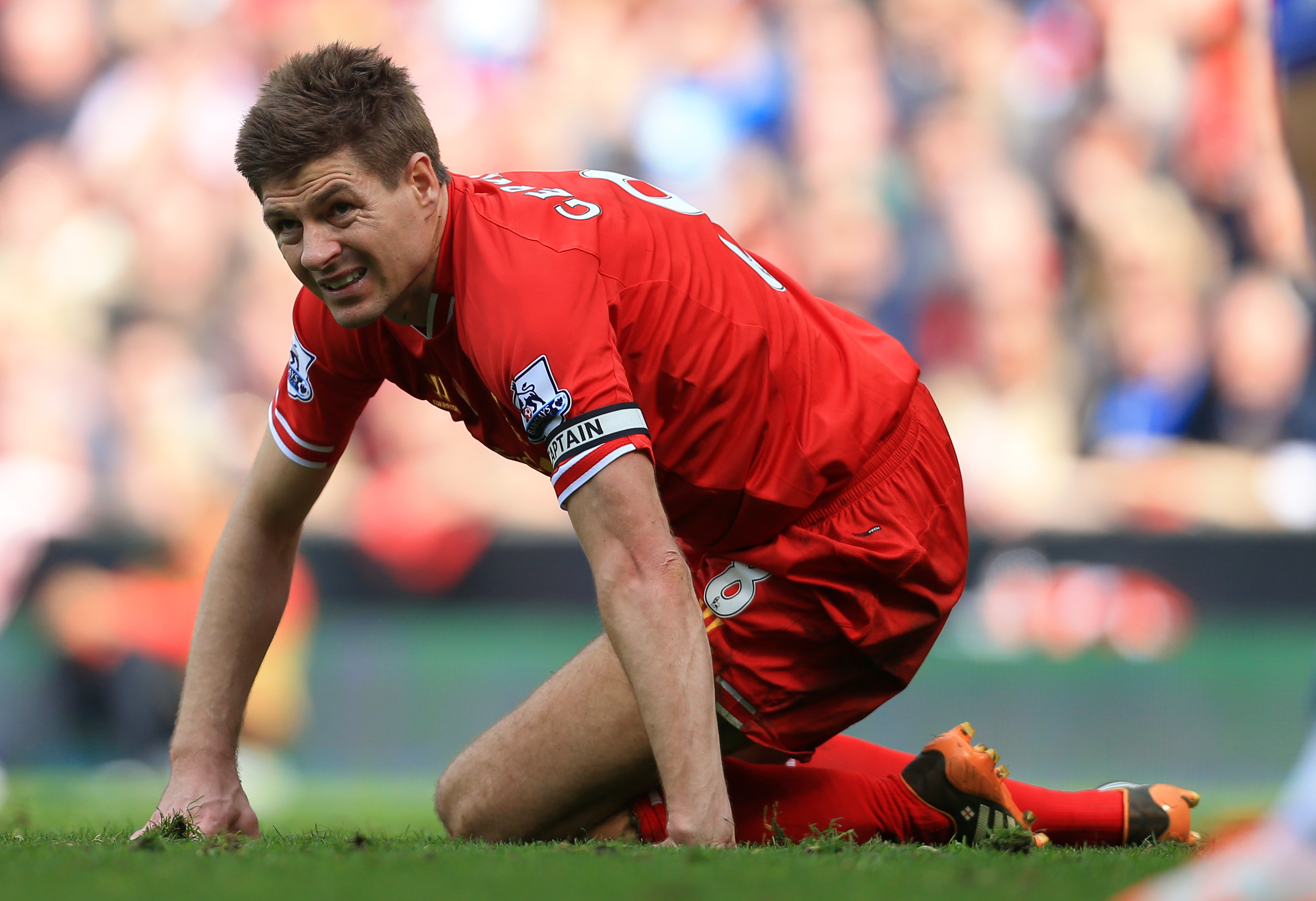Liverpool captain Steven Gerrard looks dejected after his costly slip during the Premier League match against Chelsea, April 2014