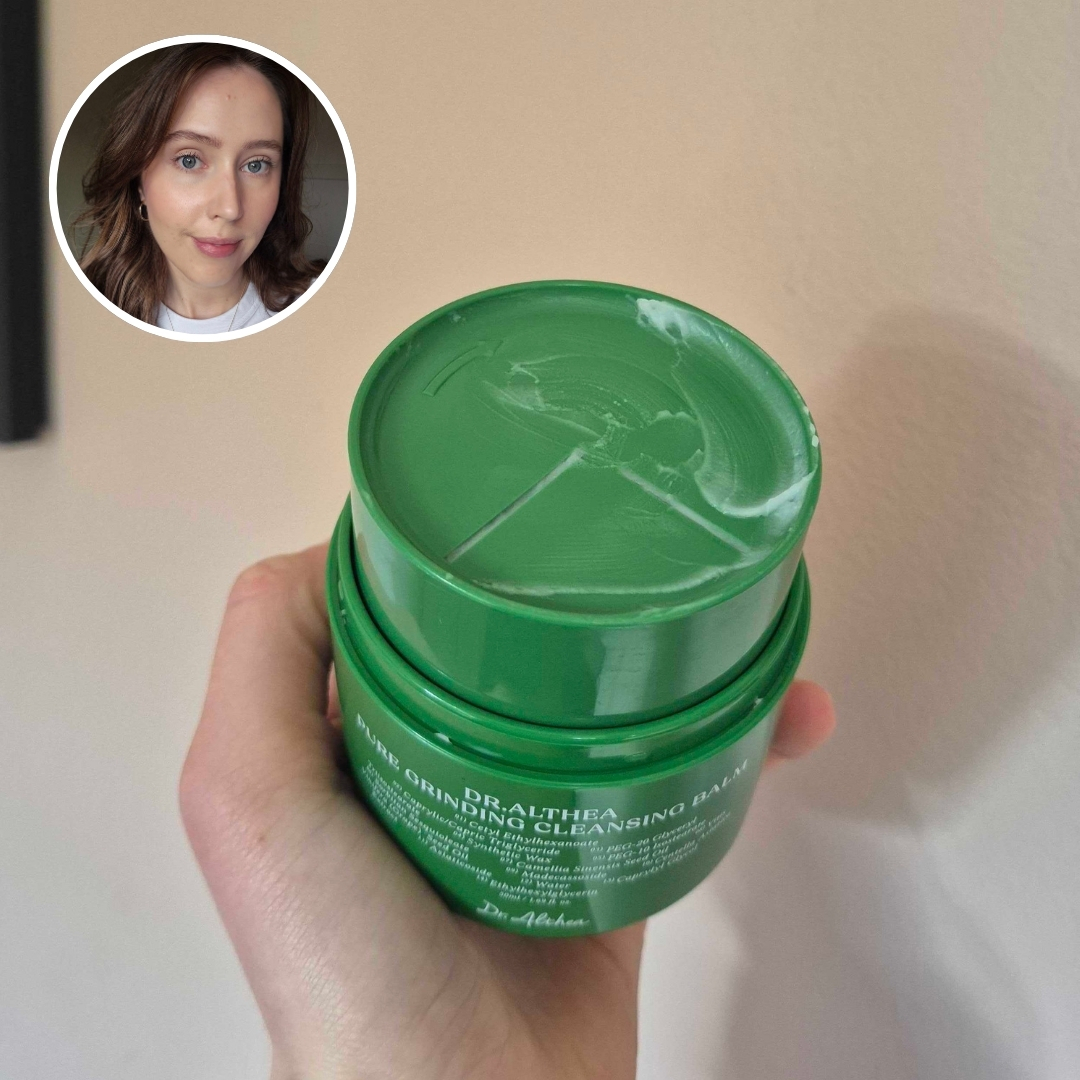 Hand holding an empty green tub of Dr Althea Pure Grinding Cleansing Balm, with circular photo of Naomi Jamieson in top left corner