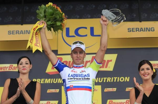 Peter Sagan (Liquigas-Cannondale) salutes from the podium.