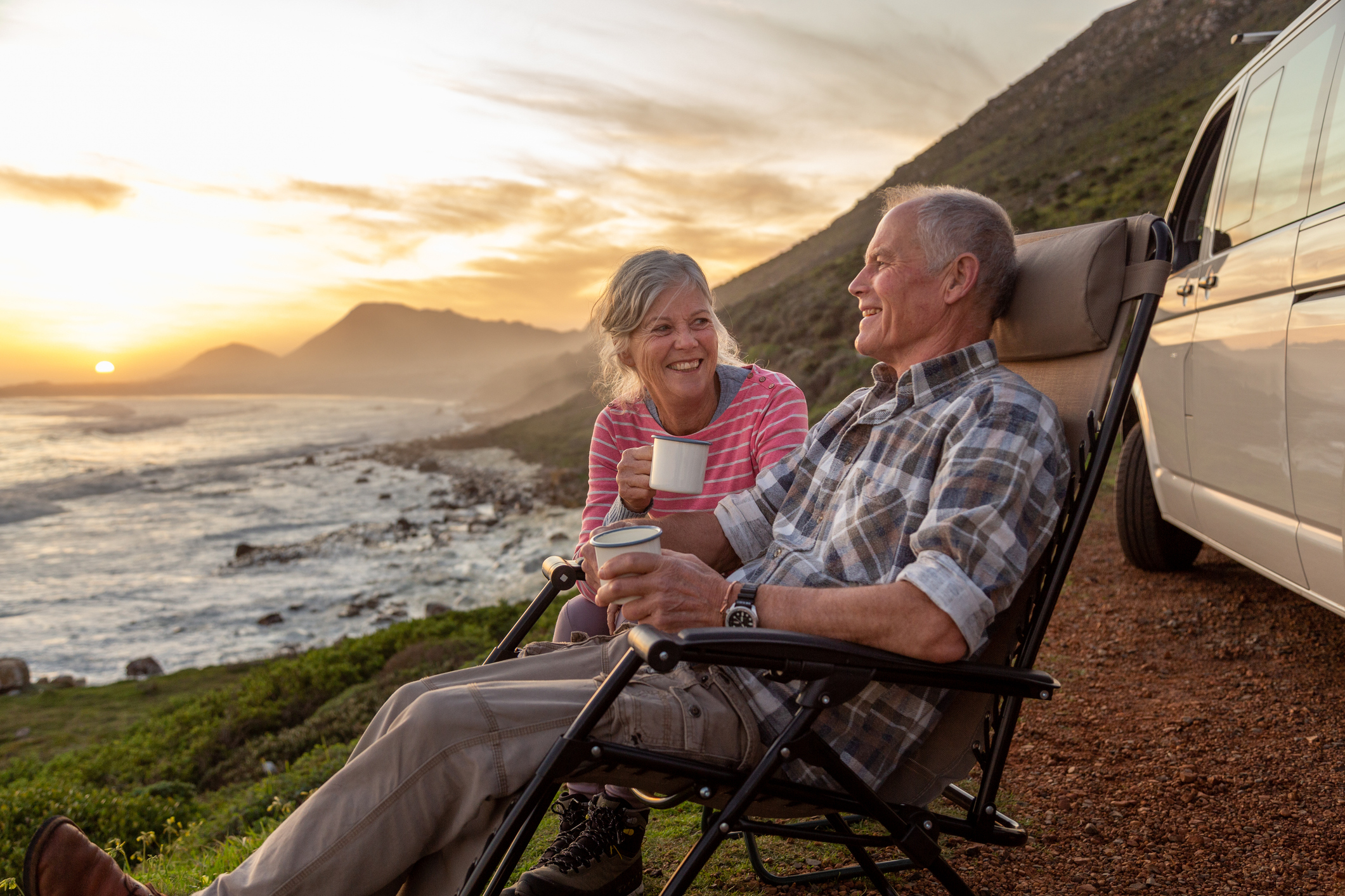 Retired couple have coffee 
