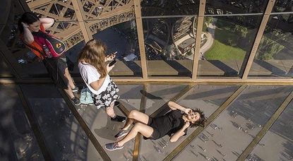Eiffel Tower's new glass floor gives visitors a different view of Paris