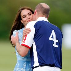 The Prince and Princess of Wales embrace at the 2023 Royal Charity Polo Cup