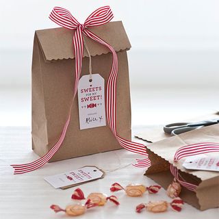 sweets with bag and label with ribbon
