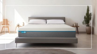 A Simba mattress on a bed in a minimalist room with a rectangle white frame