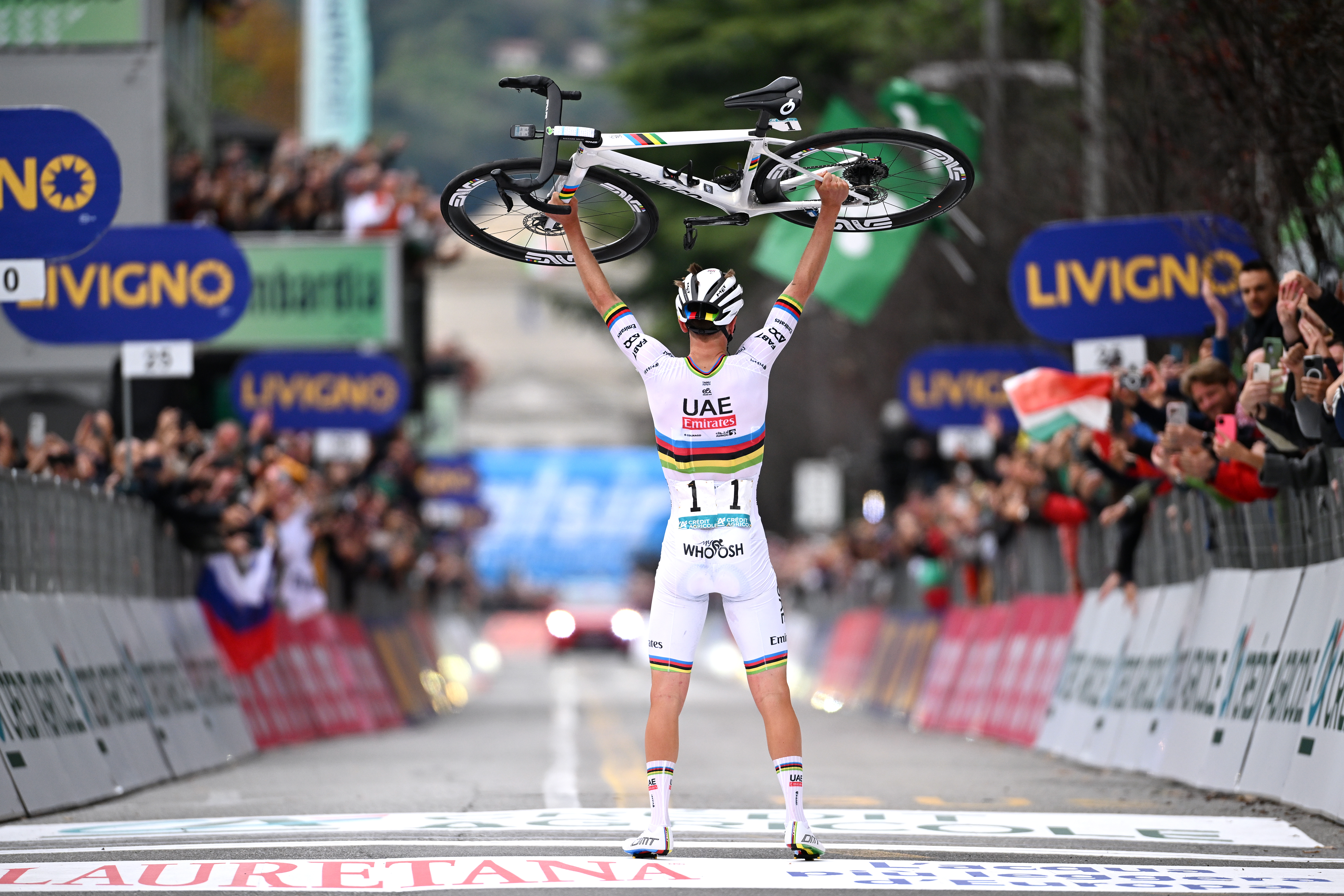 COMO, ITALY - OCTOBER 12: Tadej Pogacar of Slovenia and UAE Team Emirates celebrates at finish line as race winner during the 118th Il Lombardia 2024 a 255km one day race from Bergamo to Como / #UCIWT / on October 12, 2024 in Como, Italy. (Photo by Tim de Waele/Getty Images)