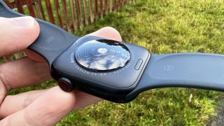 Apple Watch SE (2022) being worn by a man