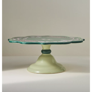 green cake stand with floral pattern 