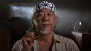 Mr. Miyagi attempts to grab a fly with chopsticks in The Karate Kid
