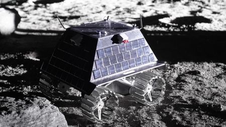 A prototype of a Canadian lunar rover in testing at the Canadian Space Agency, on moon-like terrain.