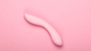 pink vibrator on pink background