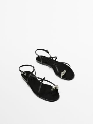Black toe detail strappy flat sandals