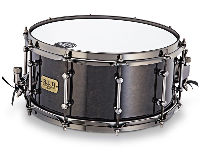 The SLP Power Maple snare has Midnight Burl finish and black nickel metalwork.