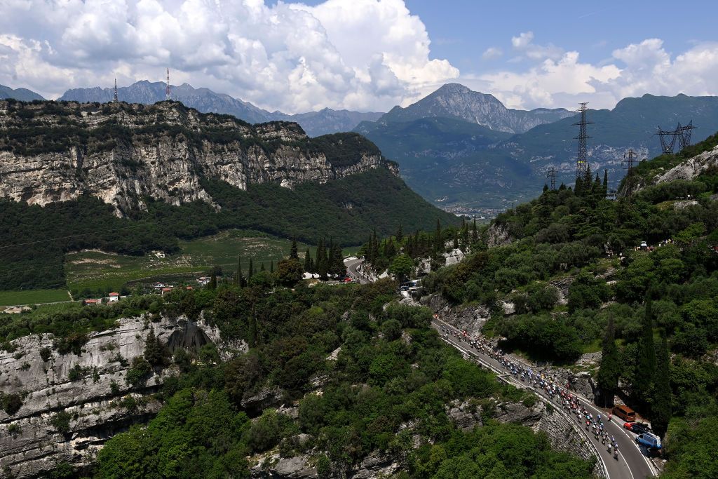 MONTE BONDONE ITALY MAY 23 A general view of the peloton compete passing through Nago 206m during the 106th Giro dItalia 2023 Stage 16 a 203km stage from Sabbio Chiese to Monte Bondone 1642m UCIWT on May 23 2023 in Monte Bondone Italy Photo by Tim de WaeleGetty Images