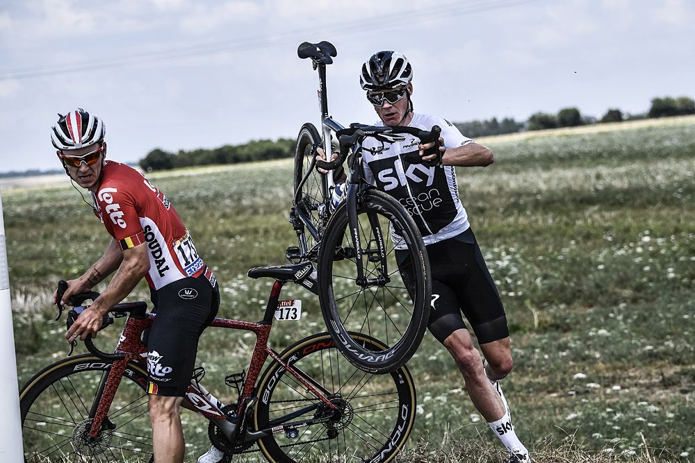 Chris Froome (Team Sky) loses time after crashing into a ditch during stage 1