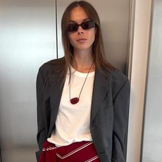  European style influencer Johanna Lager wearing a chic fall 2025 outfit with white jeans