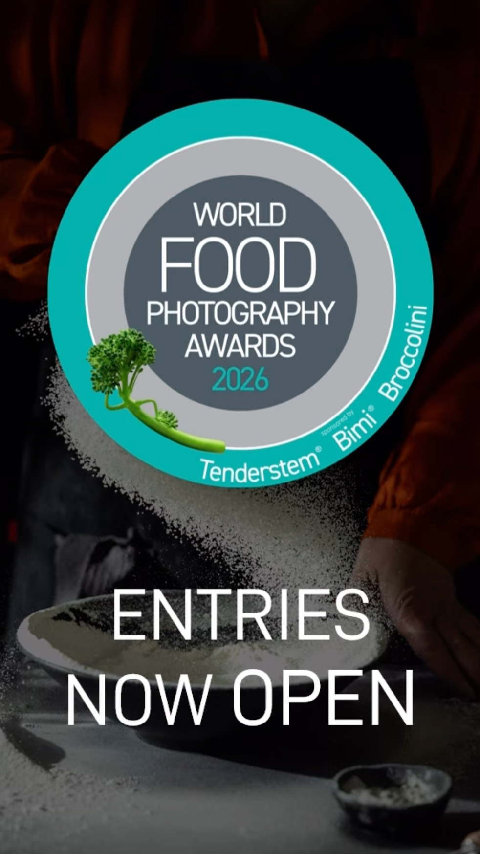 Logo for the World Food Photography Awards 2026 with &quot;Entries Now Open&quot; text, featuring a backdrop of flour being poured