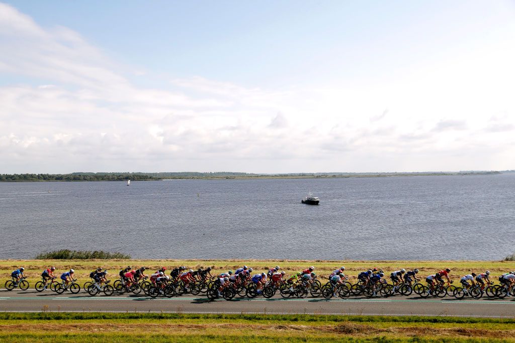 DOKKUM NETHERLANDS AUGUST 30 A general view of the peloton compete during the 17th Benelux Tour 2021 Stage 1 a 1696km stage from Surhuisterveen to Dokkum BeneluxTour on August 30 2021 in Dokkum Netherlands Photo by Bas CzerwinskiGetty Images