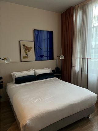 My bed at Le Grand Quartier hotel in Paris.