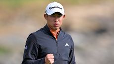 Collin Morikawa fist pumps after winning the AT&T Pebble Beach Pro-Am