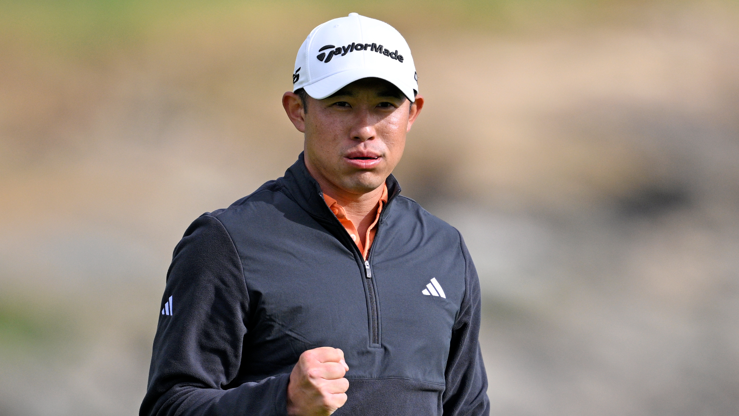 Collin Morikawa fist pumps after winning the AT&amp;T Pebble Beach Pro-Am