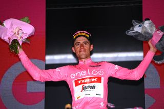JESI ITALY MAY 17 Juan Pedro Lpez of Spain and Team Trek Segafredo celebrates winning the pink leader jersey on the podium ceremony after the 105th Giro dItalia 2022 Stage 10 a 196km stage from Pescara to Jesi 95m Giro WorldTour on May 17 2022 in Jesi Italy Photo by Tim de WaeleGetty Images