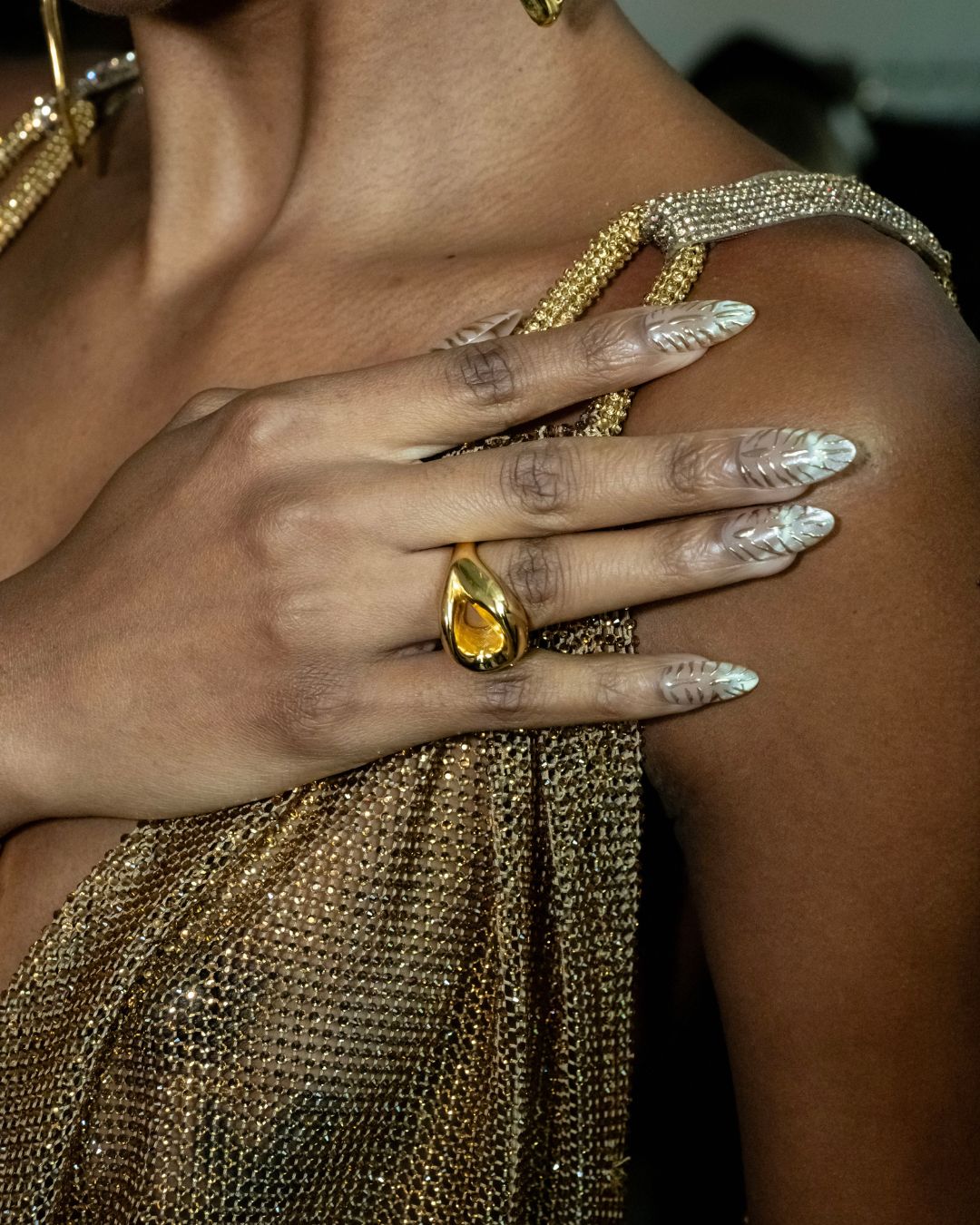 An image of the zebra chrome manicure backstage at Bronx and Banco spring/summer 26.